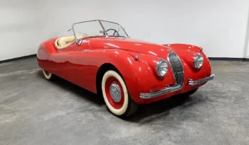 Classic Car 1954 Jaguar XK120 Roadster in Iconic Red