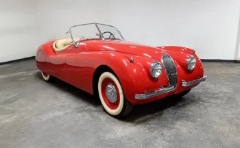 Classic Car 1954 Jaguar XK120 Roadster in Iconic Red