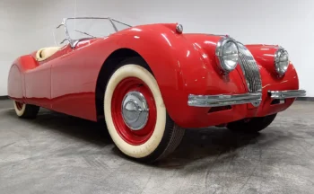 Classic Car 1954 Jaguar XK120 Roadster in Iconic Red