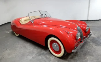 Classic Car 1954 Jaguar XK120 Roadster in Iconic Red