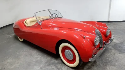 Classic Car 1954 Jaguar XK120 Roadster in Iconic Red