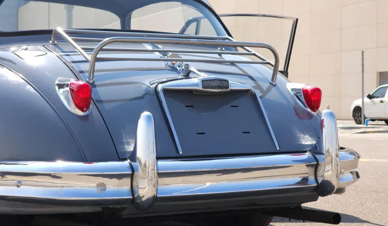 
								Classic Car 1961 Jaguar XK150 in Elegant Gray full									