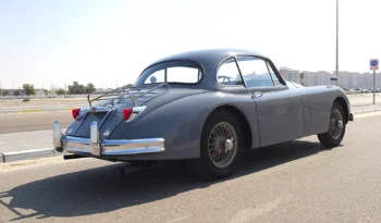 
									Classic Car 1961 Jaguar XK150 in Elegant Gray full								