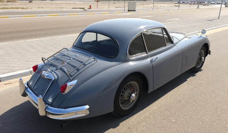 
								Classic Car 1961 Jaguar XK150 in Elegant Gray full									